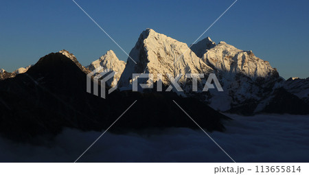 Snow covered peaks of Mt Ama Dablam, Cholatse, Taboche and Tobuche. Snow covered peaks of Mt Ama Dablam, Cholatse, Taboche and Tobuche. 113655814