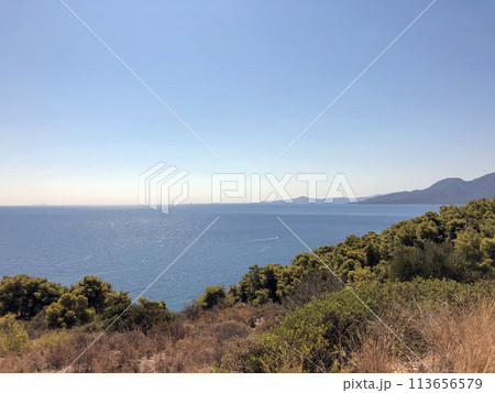 Summer Travel Vacation. View On Beautiful Beach On Greece Shore. Summer Travel Vacation. View On Beautiful Beach On Greece Shore. 113656579