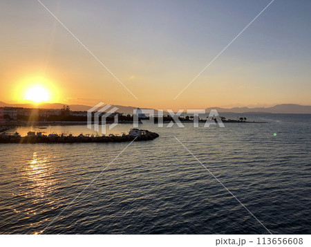 Golden Beautiful sunset at the seaside, Greece 113656608