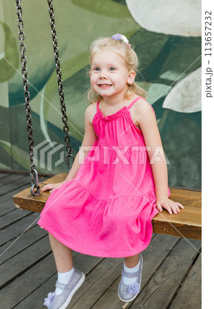Child walks with cochlear implant system. Installation cochlear implant on child girl ear for restores hearing. Kid hears after hear return to normal. Diversity inclusion concept. 113657232