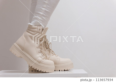 women's beige lace-up shoes with high soles on a white background classic fashion show for buying for winter autumn shoes in a milky store, High quality  113657934