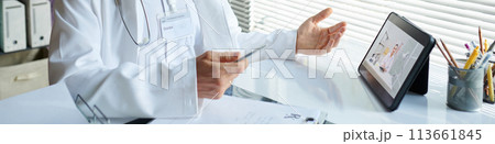 Header with doctor having online meeting with colleague from another clinic Header with doctor having online meeting with colleague from another clinic 113661845