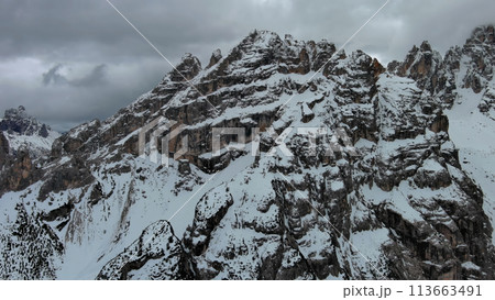 Rocky snow mountains and clouds Rocky snow mountains and clouds 113663491
