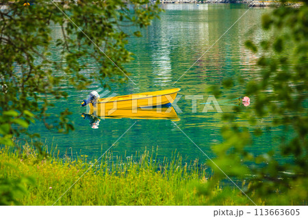 Little boat on water surface 113663605