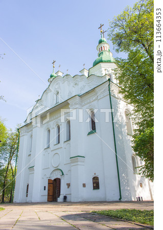 Kyiv, Ukraine - 04 11 2024: exterior of St.Cyril church in Kyiv. Springtime in back yard of Cyril church. Religious heritage of Ukrainian culture. Orthodox christian monastery. White church with cross Kyiv, Ukraine - 04 11 2024: exterior of St.Cyril church in Kyiv. Springtime in back yard of Cyril church. Religious heritage of Ukrainian culture. Orthodox christian monastery. White church with cross 113664353