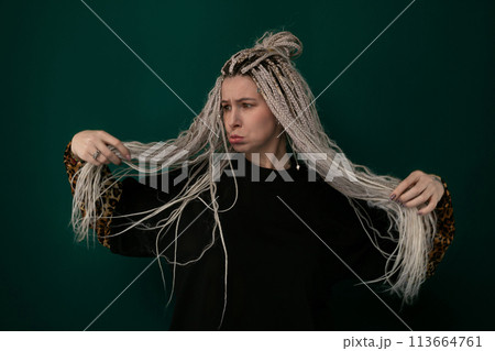 Woman Holding Her Long Hair 113664761