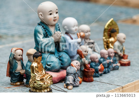 Little Buddha miniature statues at the entrance to Gumyeongsa Temple 113665013