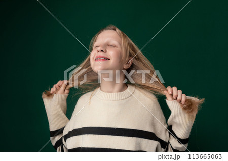 Smiling Young Girl With Blonde Hair 113665063