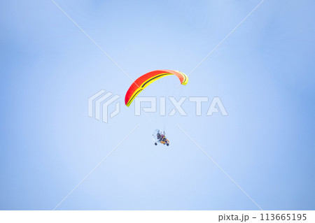 Motorized tandem flight with paratrike, double seated motorized Motorized tandem flight with paratrike, double seated motorized 113665195