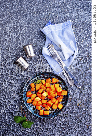 Stir-fried pumpkin on plate . Diet food 113665355