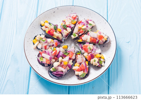 Traditional  Peruvian food background with mussels 113666623