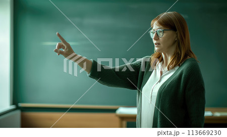 Empowering Minds, Female Teacher Educating in School Classroom Next to a Blackboard, Generative AI Empowering Minds, Female Teacher Educating in School Classroom Next to a Blackboard, Generative AI 113669230