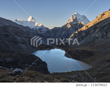mount jampayang and chanadorje and lake boyongcuo at sunrise in yading, daocheng 113670022
