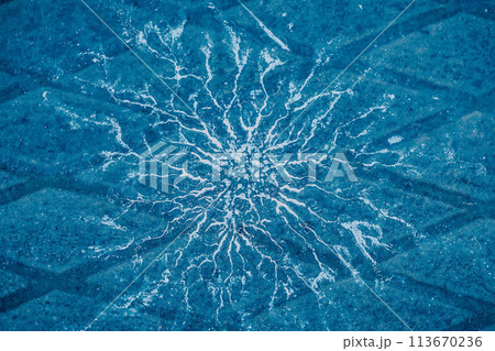 An abstract composition presents water drops scattered across the floor, bathed in a soothing blue An abstract composition presents water drops scattered across the floor, bathed in a soothing blue 113670236