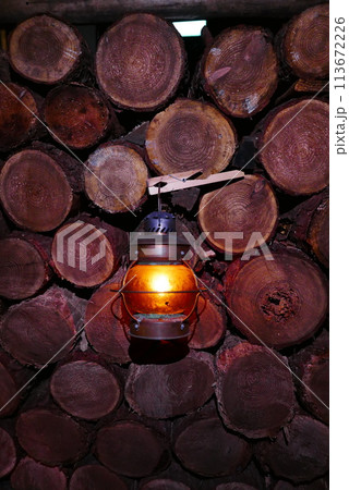 Camping at Lake Kawaguchi, Mt. Fuji in Japan. Beautiful warm light oil lamps, gasoline lanterns and logs. Camping at Lake Kawaguchi, Mt. Fuji in Japan. Beautiful warm light oil lamps, gasoline lanterns and logs. 113672226