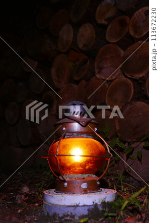 Camping at Lake Kawaguchi, Mt. Fuji in Japan. Beautiful warm light oil lamps, gasoline lanterns and logs. Camping at Lake Kawaguchi, Mt. Fuji in Japan. Beautiful warm light oil lamps, gasoline lanterns and logs. 113672230