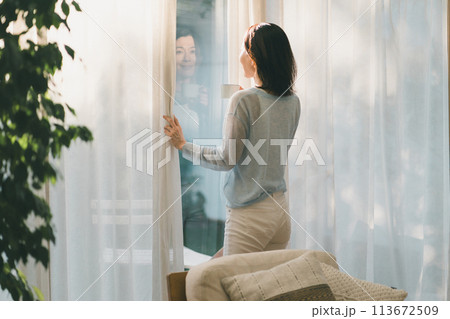 a forty-something woman a forty-something woman 113672509