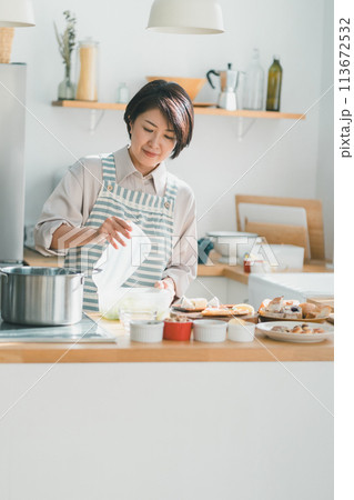 a forty-something woman a forty-something woman 113672532