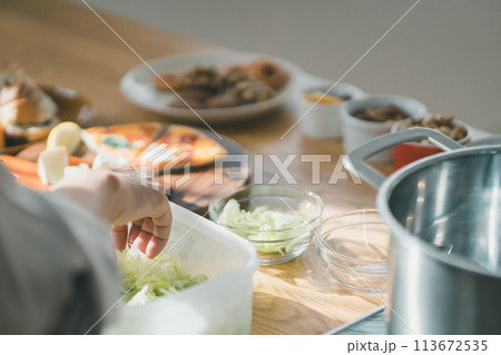 a forty-something woman a forty-something woman 113672535