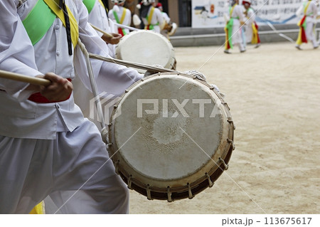 people in traditional costumes dance event 113675617