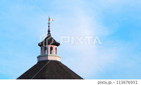 top of the Roof on blue sky. Picture for use as Background image or copy space top of the Roof on blue sky. Picture for use as Background image or copy space 113676931