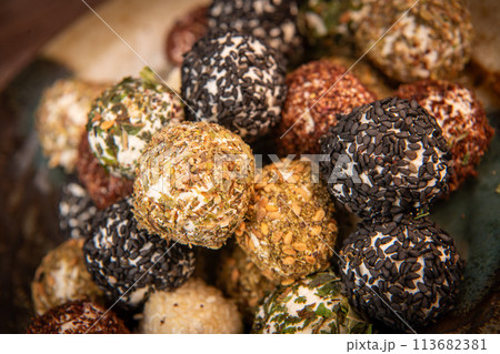 RECIPE FOR LABNEH CHEESE BOLLS WITH DRIED MINT, WHITE AND BLACK SESAME, SUMAC AND ZAATAR 113682381