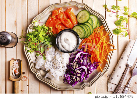 salmon salad with rice, fresh vegetables and sunflowers seed salmon salad with rice, fresh vegetables and sunflowers seed 113684479