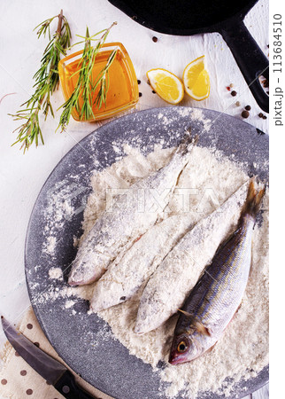 Fillet fish coated in flour. Home cooked fish fillet. 113684510