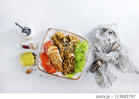 baked chicken breast with mushroom quinoa and salad baked chicken breast with mushroom quinoa and salad 113685797