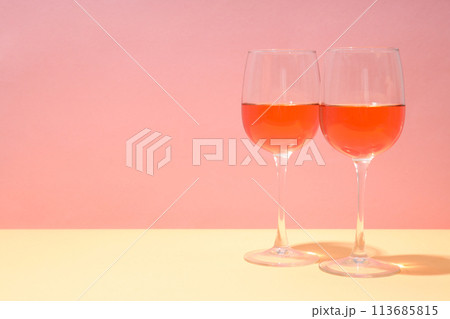 Cocktail in a glass on a light background 113685815