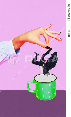 Poster. Contemporary art collage. Hand hold man's leg and want to dip it like a cookie in milk against purple background. Poster. Contemporary art collage. Hand hold man's leg and want to dip it like a cookie in milk against purple background. 113686516