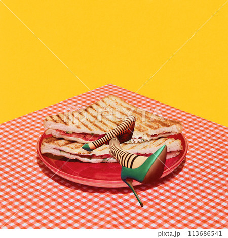 Poster. Contemporary art collage. Toasts with long female legs lying in vibrant red plate on table with retro fabric against yellow background. 113686541