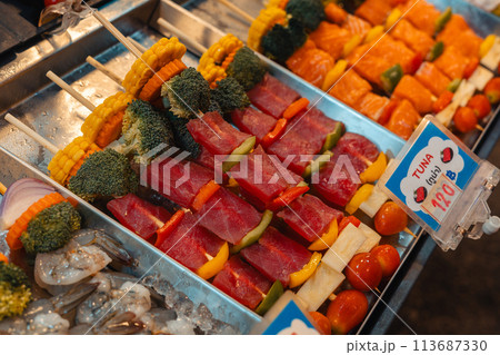 Seafood barbecue skewers for sale at street food Seafood barbecue skewers for sale at street food 113687330
