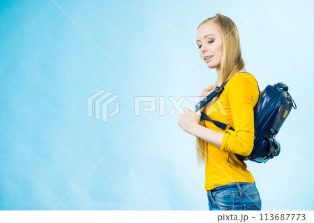 Teen girl with school backpack 113687773