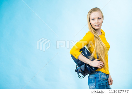 Teen girl with school backpack 113687777