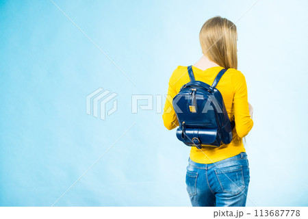Teen girl with school backpack 113687778