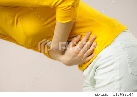 Woman suffer from belly pain. Woman suffer from belly pain. 113688144