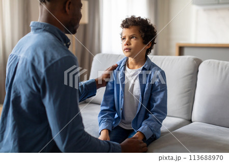 Serious conversation between father and son Serious conversation between father and son 113688970