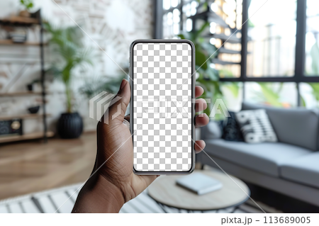 Augmented reality in interior design mockup. Close-up view of a black hand holding smartphone with transparent blank screen, ideal for digital AR design Augmented reality in interior design mockup. Close-up view of a black hand holding smartphone with transparent blank screen, ideal for digital AR design 113689005