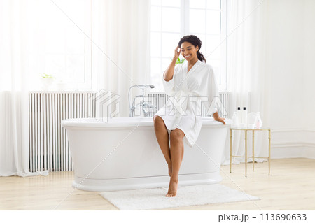 Woman relaxing on bathtub, going to take bath Woman relaxing on bathtub, going to take bath 113690633