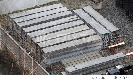 Kiev, Ukraine March 13, 2019: Foundation zero cycle construction, concrete piles at construction site Kiev, Ukraine March 13, 2019: Foundation zero cycle construction, concrete piles at construction site 113691579