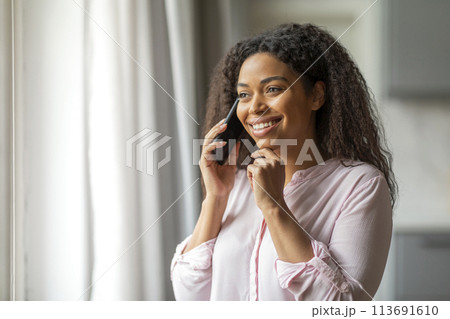 African american lady taking a phone call 113691610
