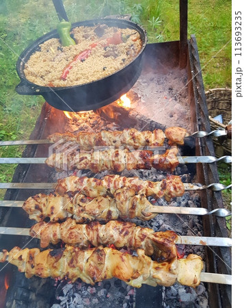 Grill barbecue kebab and pilaf food outdoor Grill barbecue kebab and pilaf food outdoor 113693235