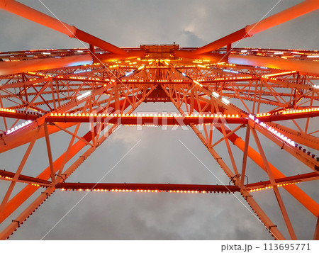 Colorful red metal structures against night sky background Colorful red metal structures against night sky background 113695771
