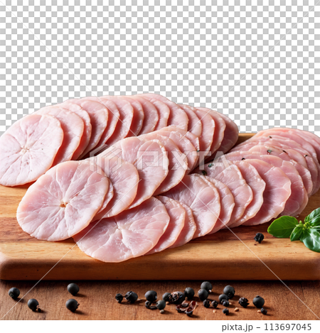 Mortadella thinly sliced and draped over a wooden serving board with a few cornichons and 113697045