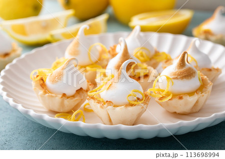 Lemon meringue tarts, one bite desserts idea Lemon meringue tarts, one bite desserts idea 113698994