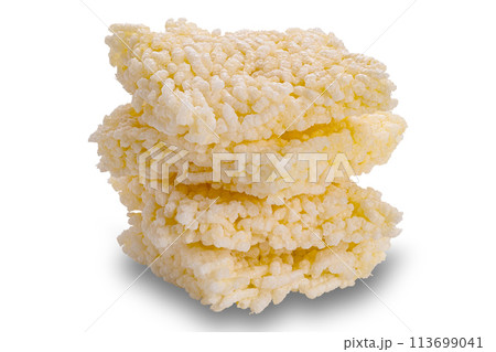 Closeup view stack of crispy homemade rice crackers isolated on white background. 113699041