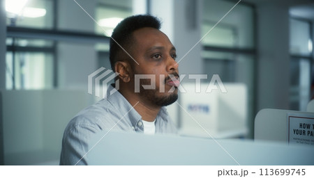African American male voter chooses which presidential candidate to vote for African American male voter chooses which presidential candidate to vote for 113699745