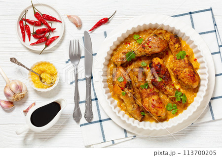 chicken drumsticks in pineapple sauce, top view chicken drumsticks in pineapple sauce, top view 113700205