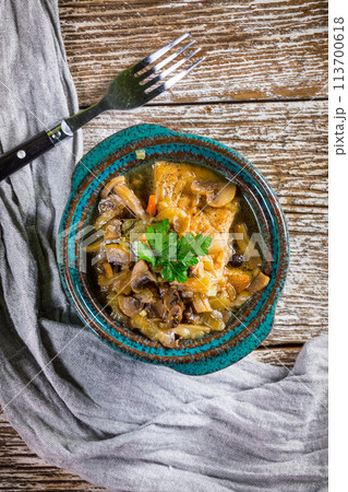 Stewed pork loin with mushrooms. Stewed pork loin with mushrooms. 113700618